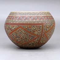 A polychrome bowl polished on the inside and decorated around the outside with a four panel small shard, fineline and geometric design, click or tap to see a larger version