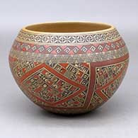 A polychrome bowl polished on the inside and decorated around the outside with a four panel small shard, fineline and geometric design
 by Rondina Huma of Hopi