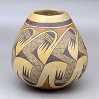 A polychrome jar decorated with a migration pattern design
 by Daisy Hooee Nampeyo of Hopi