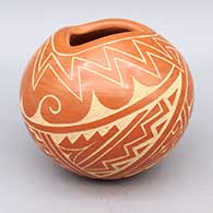 Red jar with organic opening and sgraffito geometric design
 by Carol Vigil of Jemez