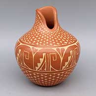 Red jar with organic opening and sgraffito geometric design
 by Carol Vigil of Jemez