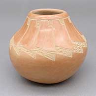 Buff jar with a sgraffito feather ring geometric design
 by Elston Yepa of Jemez