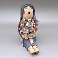 Polychrome storyteller with ten children
 by Clifford Kim Fragua of Jemez