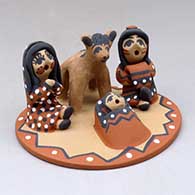 A polychrome single-piece nativity scene with Joseph, Mary, baby and pony
 by Felicia Fragua of Jemez