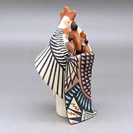 A standing chicken storyteller figure with two chicks and a blanket
 by Loren Wallowing Bull of Jemez