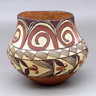 A polychrome jar decorated with a spiral, fineline and geometric design, from tourist days
 by Unknown of Isleta
