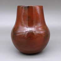 Red jar with a pine pitch coating and fire clouds, click or tap to see a larger version