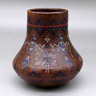 A low shouldered polychrome jar decorated with a sgraffito and painted Yeibichai and Navajo carpet design motif
 by Nancy Yazzie of Dineh