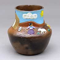 A polychrome Navajo Lifestyle bowl
 by Elizabeth Manygoats of Dineh