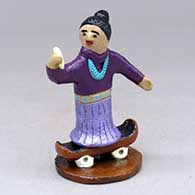 A Dineh woman on a skateboard taking a selfie
 by Elizabeth Manygoats of Dineh