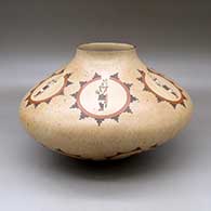 A large polychrome jar decorated with medallions of dancer and geometric design
 by Ida Sahmie of Dineh