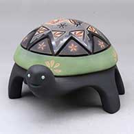 Click for a larger view A polychrome turtle figure decorated with a carved geometric design and a sgraffito and sienna hummingbird, flower and geometric design with inlaid stones
by Melony Gutierrez of Santa Clara