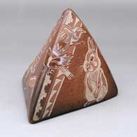 A three sided pyramid piece decorated with a sgraffito and painted deer, bird, rabbit, frog and geometric design
 by Dusty Naranjo of Santa Clara