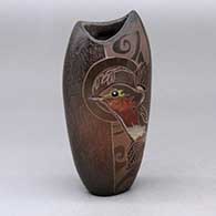 An oval polychrome jar decorated with a sgraffito and painted bird and geometric design
 by Dusty Naranjo of Santa Clara