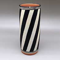 Polychrome cylinder with a geometric design
 by Thomas Tenorio of Santo Domingo