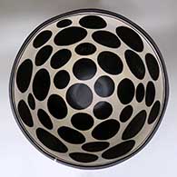 A polychrome hair washing bowl decorated inside and out with a geometric design
 by Thomas Tenorio of Santo Domingo