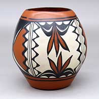 A polychrome jar decorated with a four panel geometric design
 by Unknown of Santo Domingo