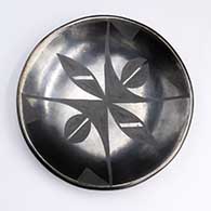 Black on black dish with geometric design
 by Maria Martinez of San Ildefonso