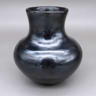 Polished black jar with a flared opening
 by Santana Martinez of San Ildefonso