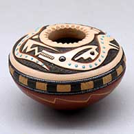 A small polychrome seed pot decorated with a notched rim and a sgraffito avanyu and geometric design with inlaid stones the length of the avanyu
 by Russell Sanchez of San Ildefonso