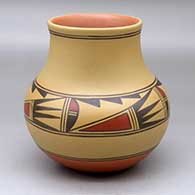 A polychrome jar decorated with a four panel geometric design around the shoulder
 by Johnny Cruz of San Ildefonso