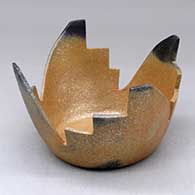 An open golden micaceous bowl with a four sided kiva step cut rim and fire clouds
 by Angie Yazzie of Taos
