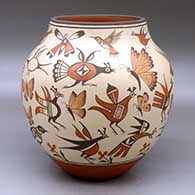 Click for a larger view A large polychrome jar decorated with images of birds, butterflies, dragonflies, flowers and flying insects
by Marcellus Medina of Zia