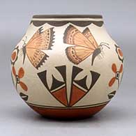 A small polychrome jar decorated with a two panel hummingbird, butterfly, flower and geometric design, click or tap to see a larger version