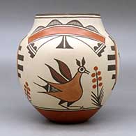 A polychrome jar decorated with a four panel roadrunner, Zia sun sign, flower, rainbow and geometric design, click or tap to see a larger version