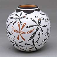 A polychrome jar decorated with a dragonfly design
 by Anderson Jamie Peynetsa of Zuni