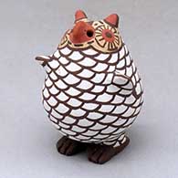 A polychrome standing owl figure
 by Erma Homer of Zuni