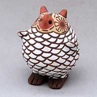 A polychrome standing owl figure
 by Erma Homer of Zuni