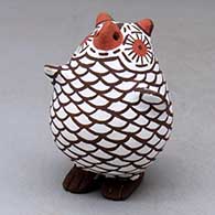 A polychrome standing owl figure
 by Erma Homer of Zuni