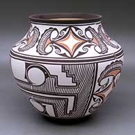 A polychrome jar with a recurved neck and decorated with a four panel rainbird, cloud and geometric design
 by Carlos Laate of Zuni