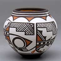 A small polychrome jar decorated with a four panel rainbird and geometric design
 by Carlos Laate of Zuni
