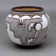 A polychrome jar decorated with a two-panel rainbird, fineline and geometric design
 by Carlos Laate of Zuni