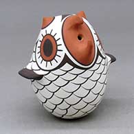 A small polychrome owl effigy
 by Anderson Jamie Peynetsa of Zuni