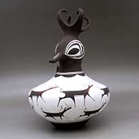 A polychrome duck pot decorated around the body with a deer with heart line and geometric design, click or tap to see a larger version