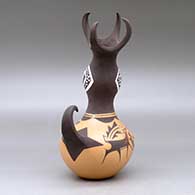 A polychrome duck pot decorated around the body with a deer with heart line, mountains, forest and geometric design, click or tap to see a larger version