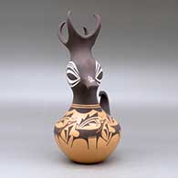 A polychrome duck pot decorated around the body with a deer with heart line, mountains, forest and geometric design, click or tap to see a larger version