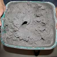 Clay soaking in a bin