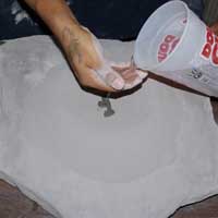 The powder mix gets some water added